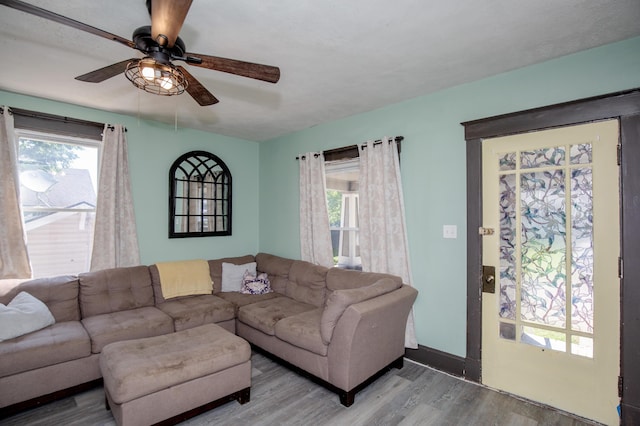 15 21st St, Newport, KY 41071 - living area with wood finished floors and ceiling fan
