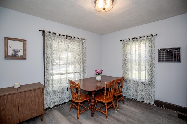 15 21st St, Newport, KY 41071 - dining room featuring wood finished floors and an AC wall unit