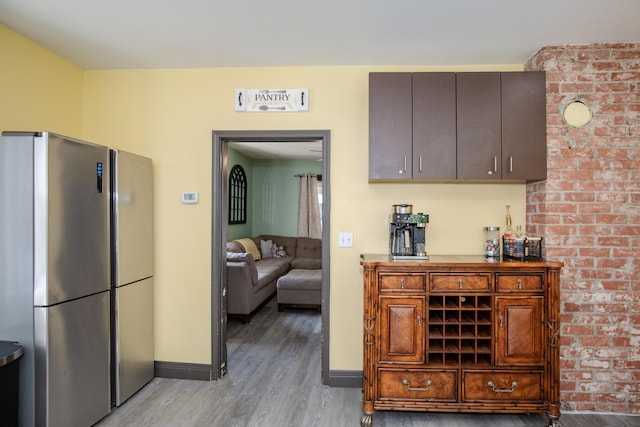 15 21st St, Newport, KY 41071 - kitchen featuring freestanding refrigerator and light wood-type flooring