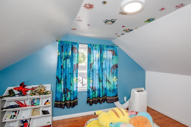 15 21st St, Newport, KY 41071 - playroom with lofted ceiling and wood finished floors