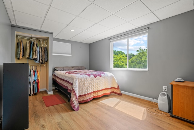 10302 Limerick Cir, Covington, KY 41015 - bedroom with a paneled ceiling, wood finished floors, and a closet