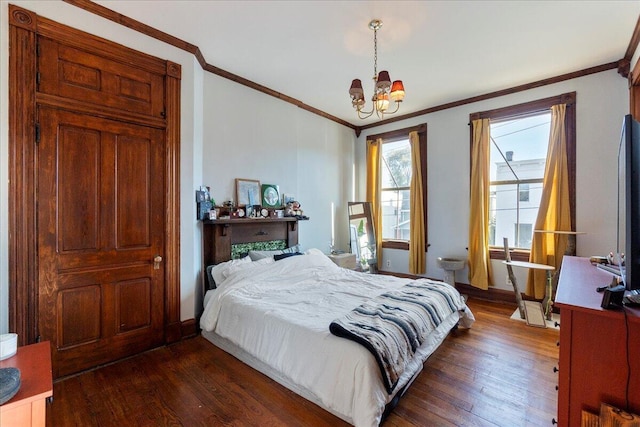 411 E 10th St, Newport, KY 41071 - bedroom featuring a chandelier, ornamental molding, and dark wood-type flooring