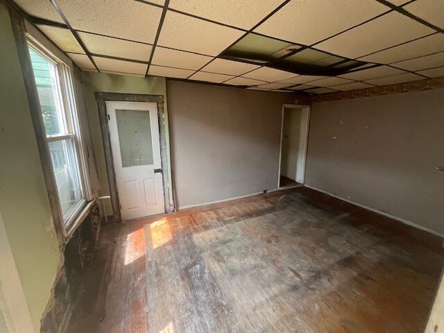 1130 Ann St, Newport, KY 41071 - unfurnished room with wood finished floors and a paneled ceiling