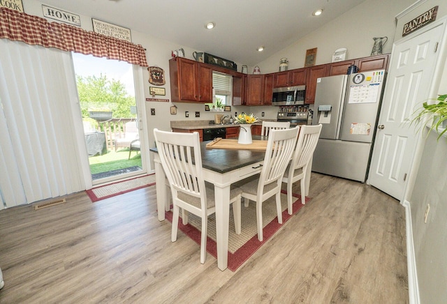 1155 Breckenridge Ln, Hebron, KY 41048 - dining room with light wood-style floors, vaulted ceiling, and recessed lighting