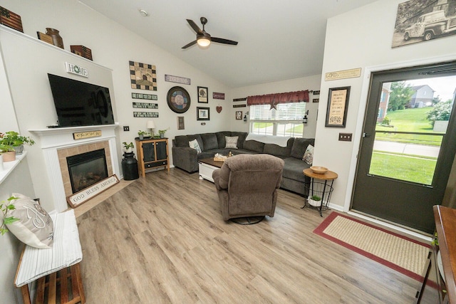 1155 Breckenridge Ln, Hebron, KY 41048 - living room featuring ceiling fan, light wood finished floors, a fireplace, and high vaulted ceiling