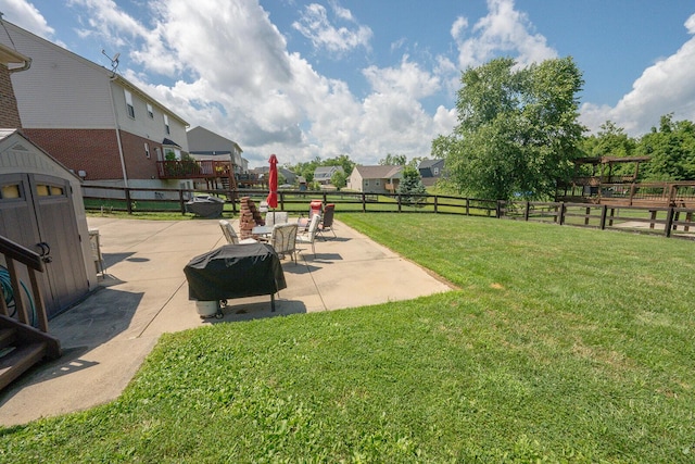 1155 Breckenridge Ln, Hebron, KY 41048 - view of yard featuring a patio, a residential view, and a storage unit
