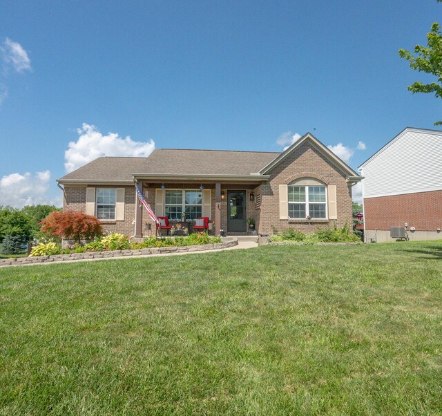 1155 Breckenridge Ln, Hebron, KY 41048 - ranch-style home featuring a front lawn, brick siding, and covered porch