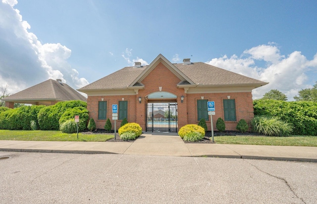 1155 Breckenridge Ln, Hebron, KY 41048 - view of front facade featuring brick siding and a gate
