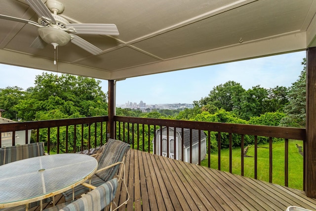 94 Mayo Cir, Newport, KY 41071 - wooden terrace with a storage unit, a ceiling fan, a yard, and outdoor dining area