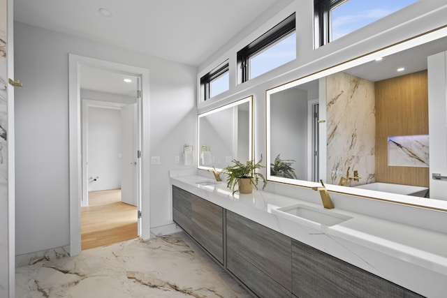 5090 Bella Vista Dr, Cold Spring, KY 41076 - full bathroom with marble finish flooring, double vanity, a soaking tub, and recessed lighting