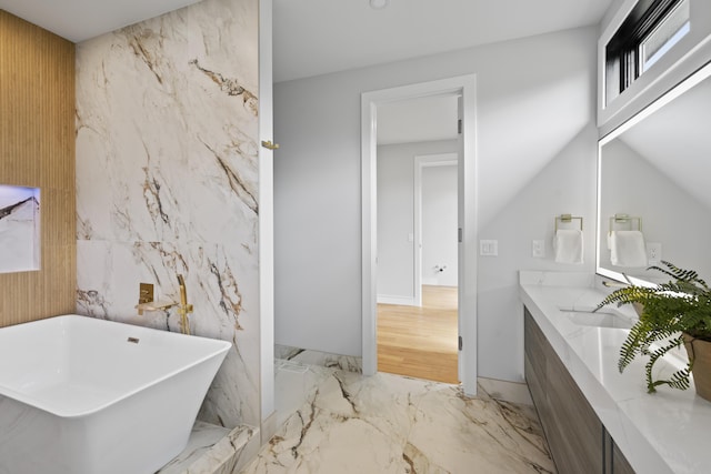 5090 Bella Vista Dr, Cold Spring, KY 41076 - bathroom featuring a freestanding tub, marble tiled floors, and double vanity