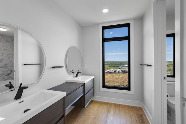 5090 Bella Vista Dr, Cold Spring, KY 41076 - bathroom featuring vanity, healthy amount of natural light, wood finished floors, and recessed lighting
