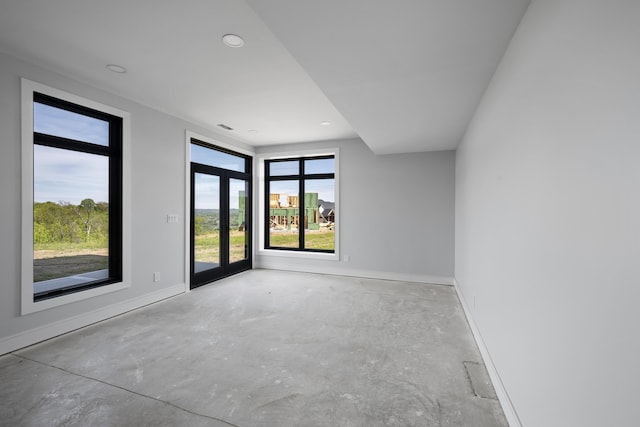 5090 Bella Vista Dr, Cold Spring, KY 41076 - empty room featuring unfinished concrete flooring and recessed lighting