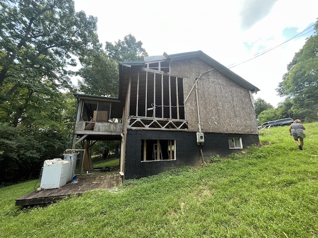 483 Elk Rd, Owenton, KY 40359 - rear view of house with a lawn and a sunroom