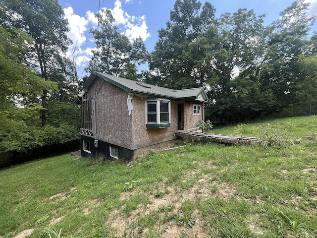 483 Elk Rd, Owenton, KY 40359 - view of side of property with a metal roof and a lawn