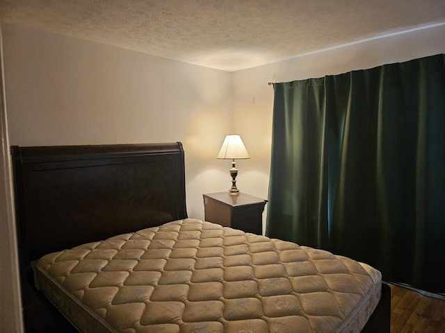 2454 Horton St, Crescent Springs, KY 41017 - bedroom with a textured ceiling and dark wood-style floors