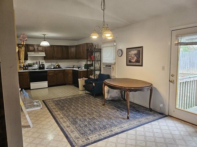2454 Horton St, Crescent Springs, KY 41017 - kitchen with range with electric cooktop, light flooring, dark brown cabinets, cooling unit, and pendant lighting