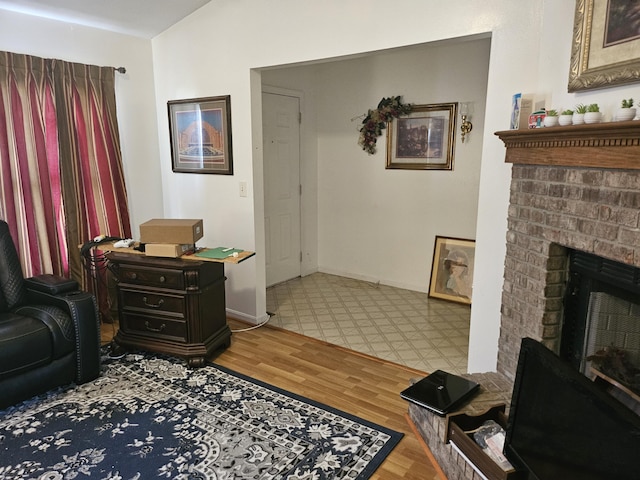 2454 Horton St, Crescent Springs, KY 41017 - living area featuring a fireplace and wood finished floors