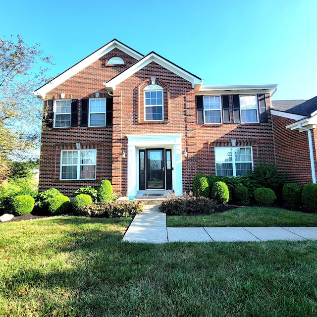 4467 Hackberry Ct, Burlington, KY 41005 - view of front of home featuring brick siding and a front lawn