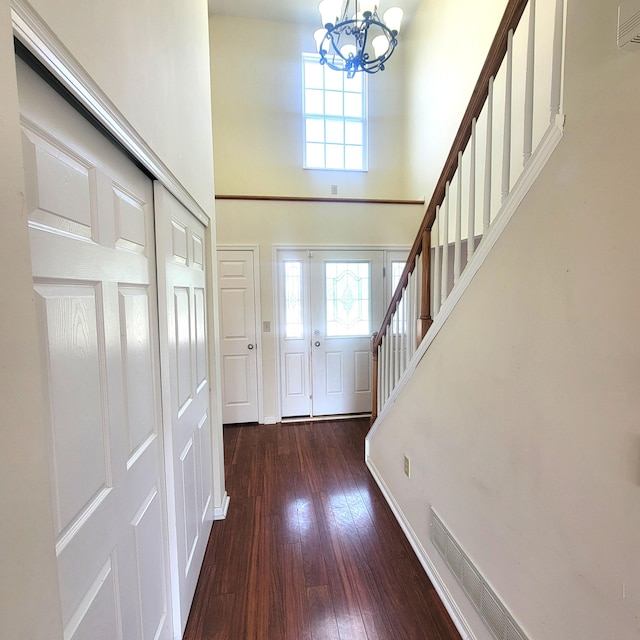 4467 Hackberry Ct, Burlington, KY 41005 - foyer entrance featuring a chandelier, a high ceiling, stairs, and hardwood / wood-style floors