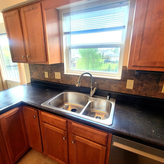 4467 Hackberry Ct, Burlington, KY 41005 - kitchen with dishwasher, healthy amount of natural light, and brown cabinetry