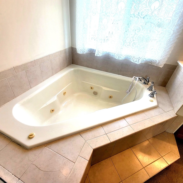 4467 Hackberry Ct, Burlington, KY 41005 - bathroom with a jetted tub and tile patterned floors