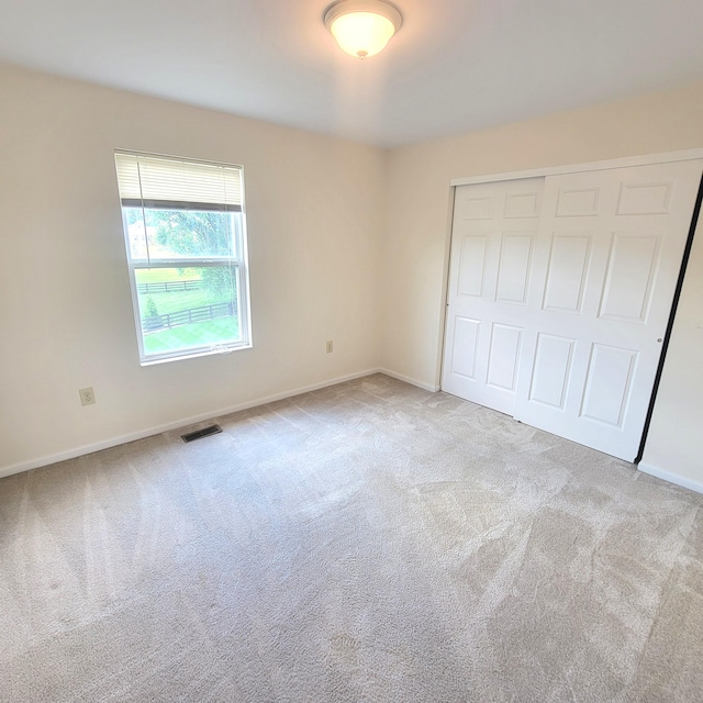 4467 Hackberry Ct, Burlington, KY 41005 - unfurnished bedroom featuring carpet floors and a closet