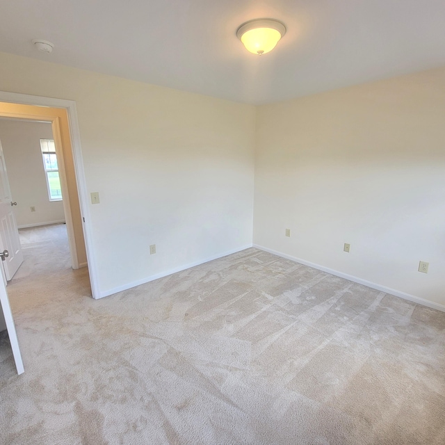 4467 Hackberry Ct, Burlington, KY 41005 - empty room with light colored carpet and a smoke detector