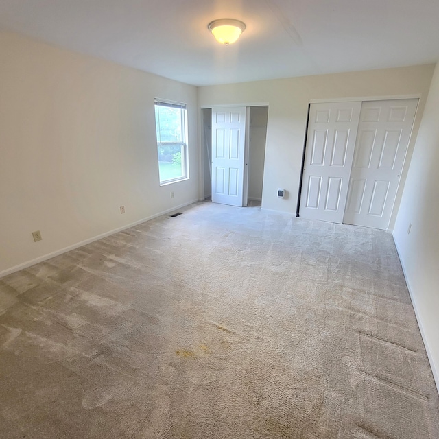 4467 Hackberry Ct, Burlington, KY 41005 - unfurnished bedroom with two closets and carpet floors