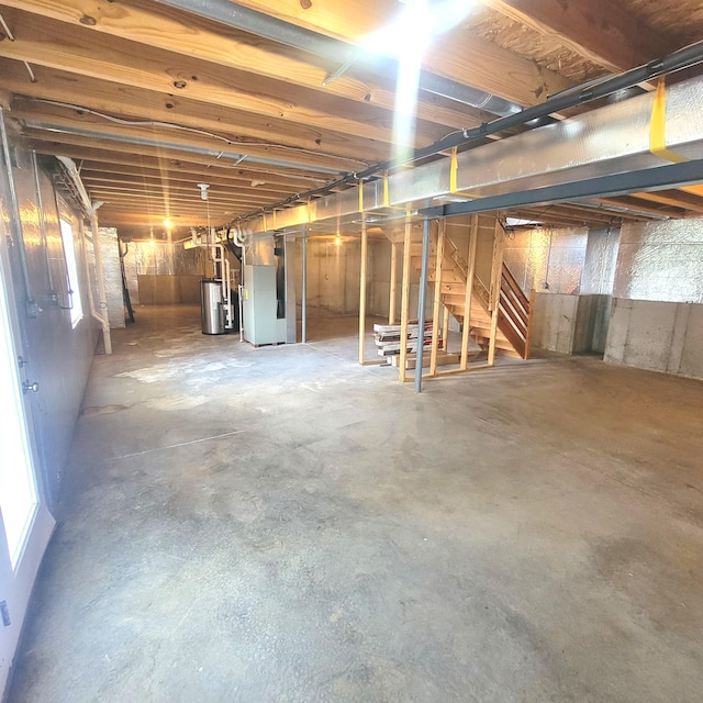 4467 Hackberry Ct, Burlington, KY 41005 - basement with water heater, heating unit, and stairway