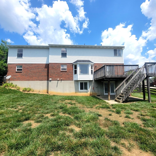 4467 Hackberry Ct, Burlington, KY 41005 - rear view of property featuring brick siding, stairs, a deck, and a yard