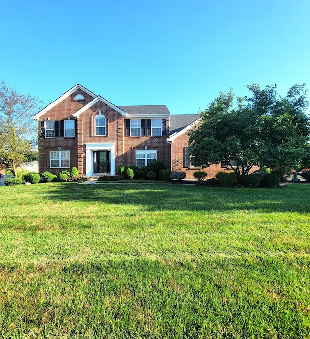 4467 Hackberry Ct, Burlington, KY 41005 - view of front of house featuring brick siding and a front yard