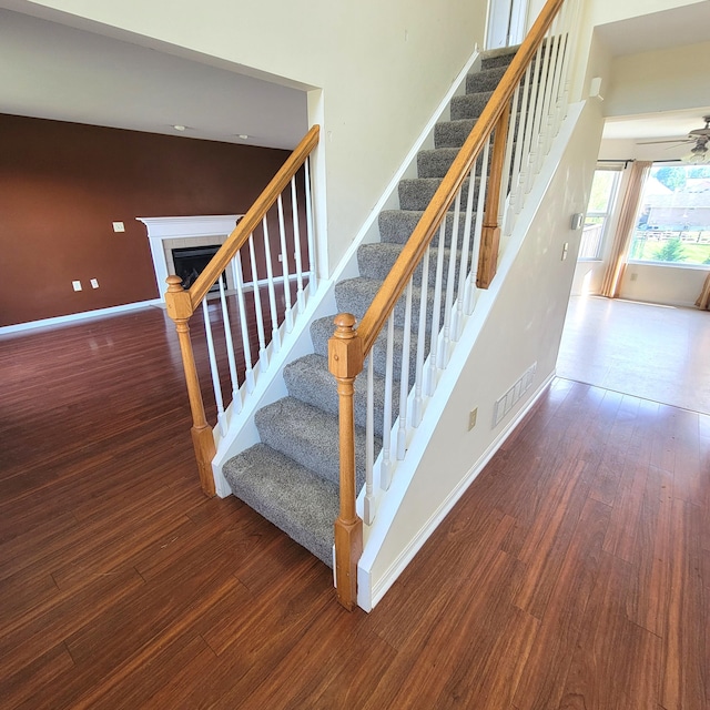 4467 Hackberry Ct, Burlington, KY 41005 - stairs featuring wood finished floors and a fireplace