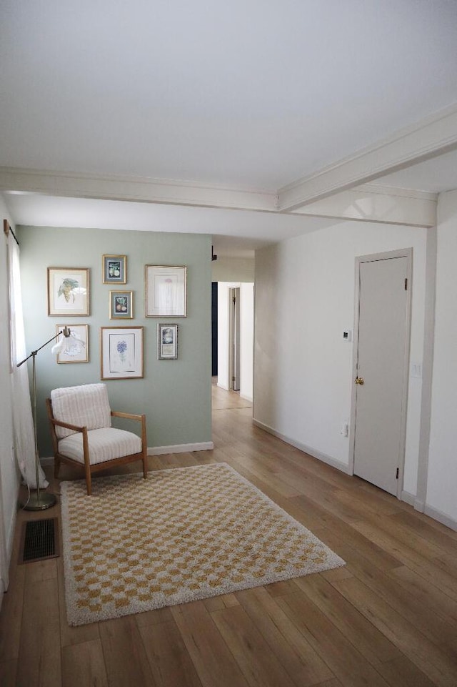 713 Ferncliffe Ave, Crescent Springs, KY 41017 - living area with wood-type flooring and baseboards