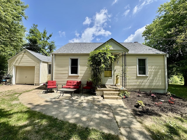 12155 Riggs Rd, Independence, KY 41051 - view of front of house featuring a shingled roof, an outdoor structure, and an outdoor living space