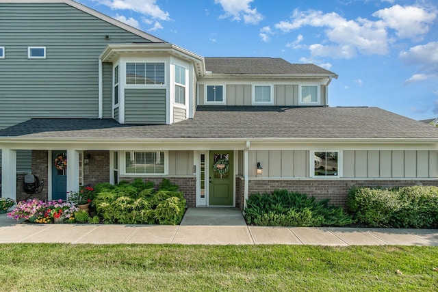 2175 Piazza Rdg, Covington, KY 41017 - view of front facade with brick siding, board and batten siding, and a shingled roof