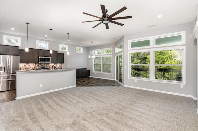 2175 Piazza Rdg, Covington, KY 41017 - kitchen with appliances with stainless steel finishes, dark colored carpet, open floor plan, and recessed lighting