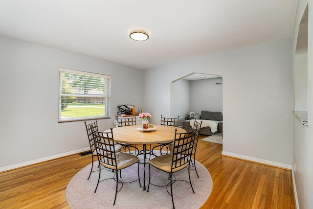 65 W Crittenden Ave, Fort Wright, KY 41011 - dining area with arched walkways and light wood-type flooring