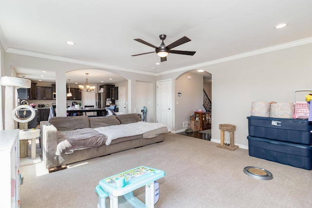 1353 Dominion Trl, Hebron, KY 41048 - living room with arched walkways, carpet floors, ceiling fan, a chandelier, and recessed lighting