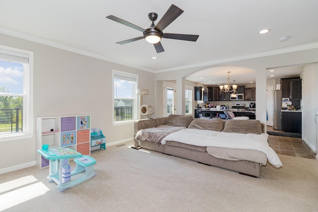 1353 Dominion Trl, Hebron, KY 41048 - living area featuring a chandelier, light colored carpet, healthy amount of natural light, recessed lighting, and arched walkways