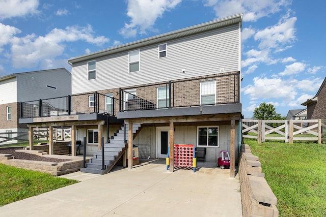 1353 Dominion Trl, Hebron, KY 41048 - back of house with a patio, stairs, a deck, and brick siding