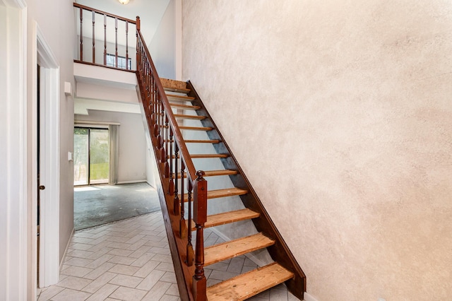 2646 Bryan Station Ln, Crestview Hills, KY 41017 - stairs with a high ceiling and brick floors