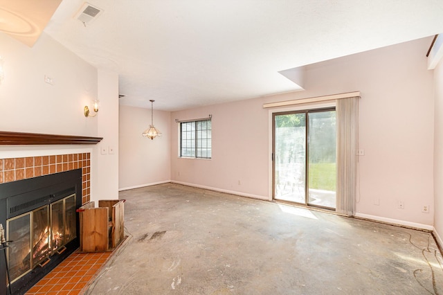 2646 Bryan Station Ln, Crestview Hills, KY 41017 - unfurnished living room featuring concrete floors and a tiled fireplace