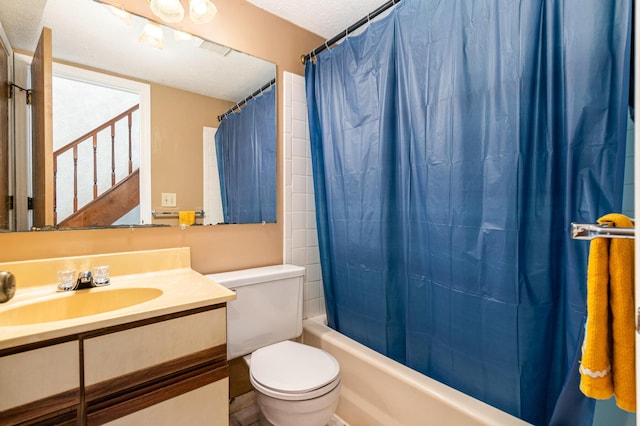 2646 Bryan Station Ln, Crestview Hills, KY 41017 - bathroom with vanity, shower / bath combination with curtain, and a textured ceiling