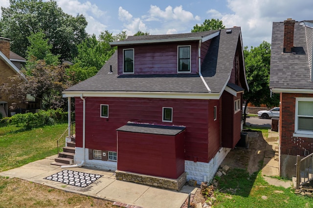 21141/2 Glenway Ave, Covington, KY 41014 - back of house with a shingled roof and a patio