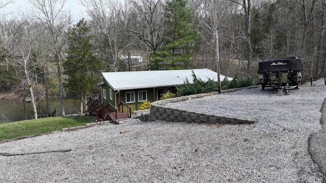 445 Davis Lake Rd # 1, Owenton, KY 40359 - view of front of property with a metal roof, a porch, and a wooded view