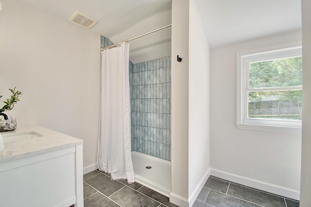 797 Highland Ave, Fort Wright, KY 41011 - bathroom with tile patterned flooring, a tile shower, and vanity