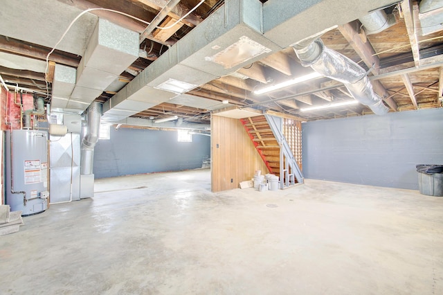 797 Highland Ave, Fort Wright, KY 41011 - below grade area featuring gas water heater, stairs, and heating unit