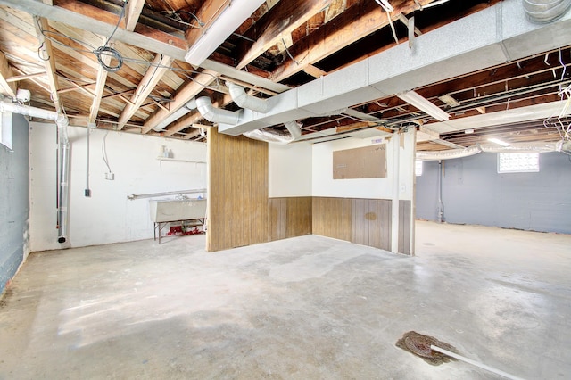 797 Highland Ave, Fort Wright, KY 41011 - basement featuring a sink and wood walls