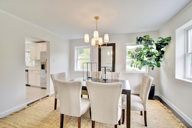 797 Highland Ave, Fort Wright, KY 41011 - dining room with a chandelier and ornamental molding